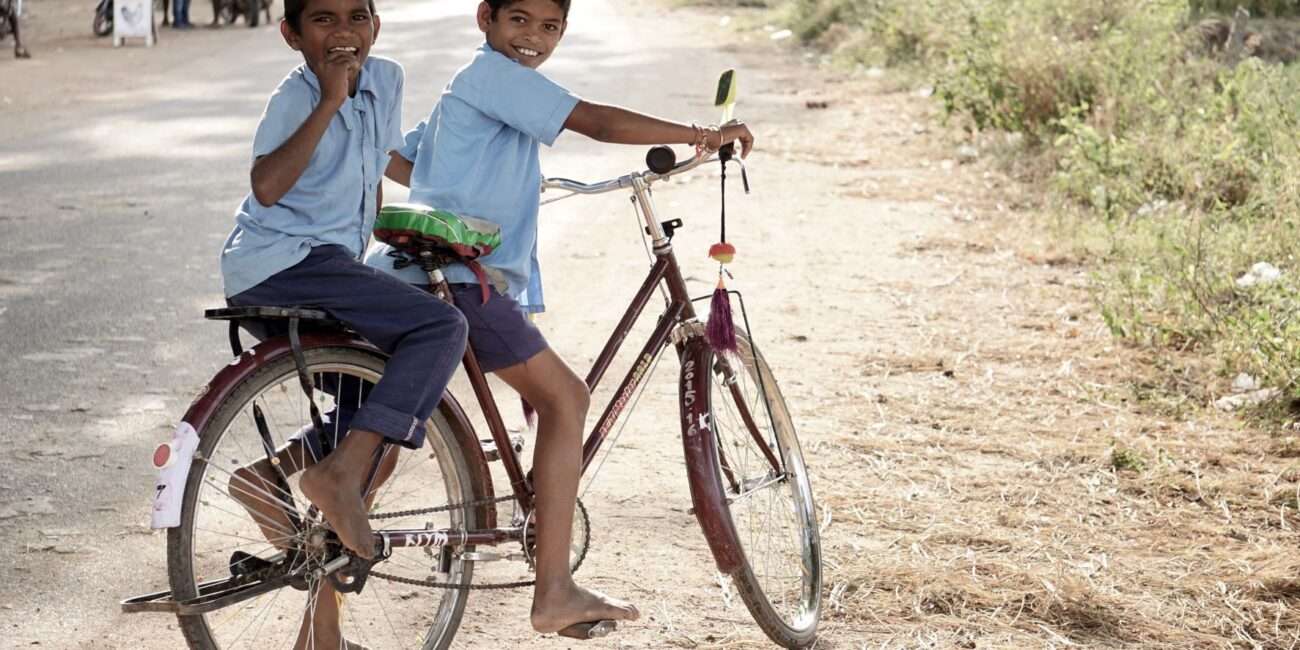 Two boys on a bike free of child labour
