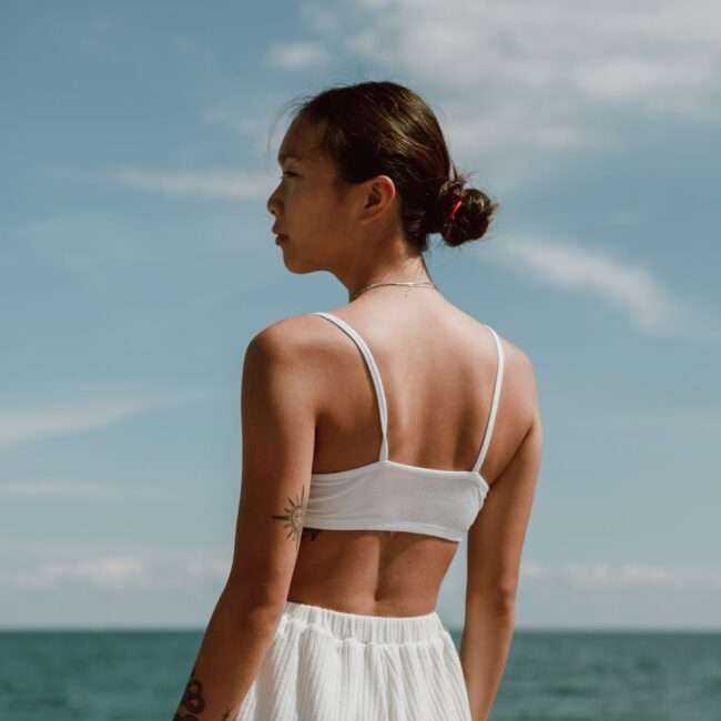 Woman looking out to sea