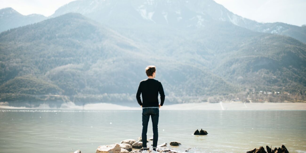 Man looking at water