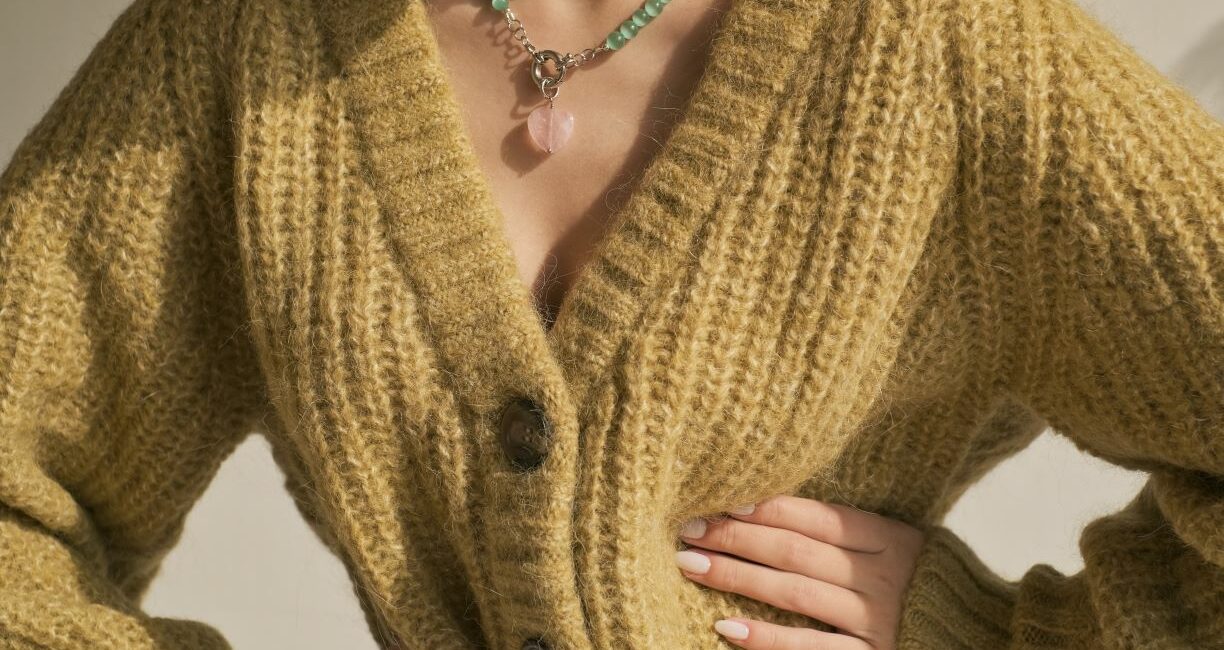 Girl in yellow ethical jumper UK