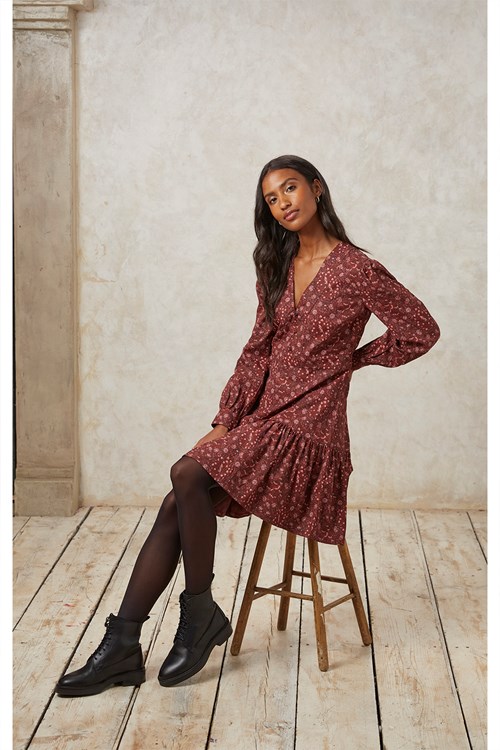 People Treek dress worn by a vegan lady sitting on a chair